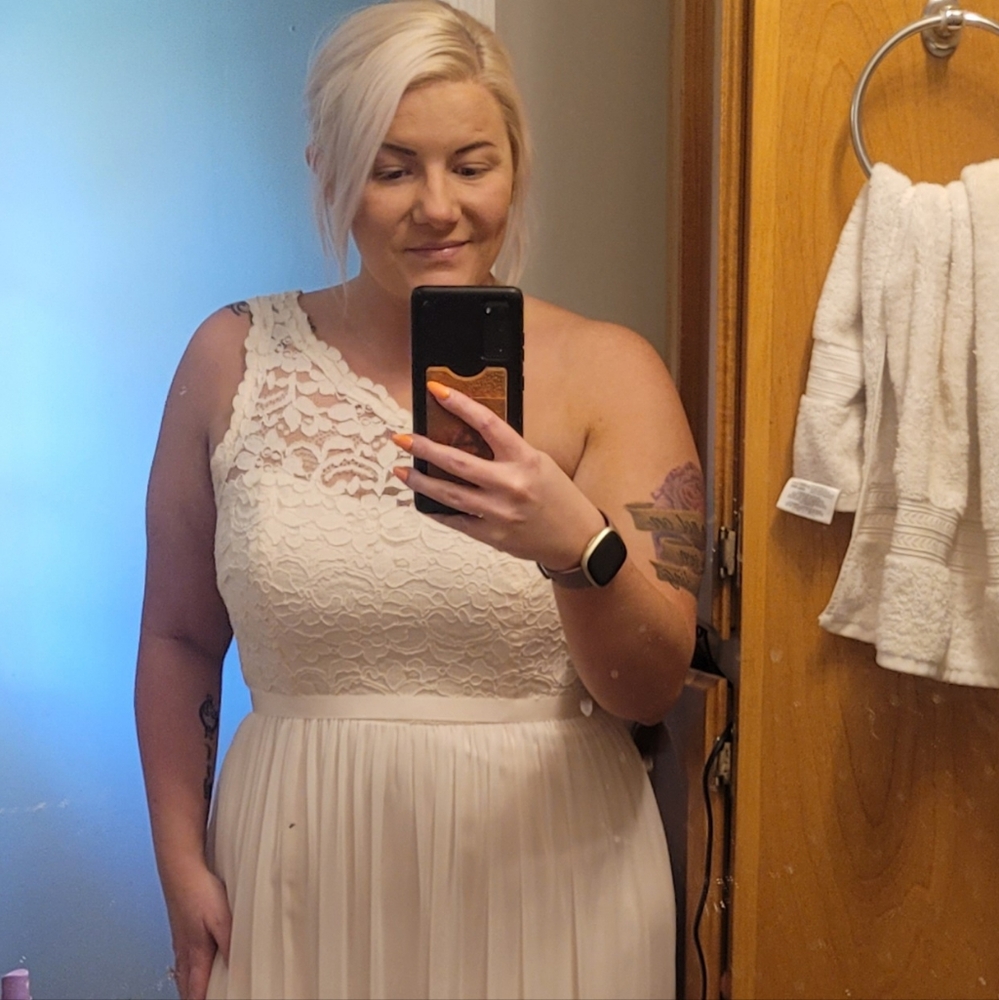 Very light blush size 12 David's bridal chiffon one shoulder dress.